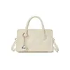 Bolso de mano de nicho de lujo para mujer con un elegante diseño coreano, bolso de hombro acolchado de alta gama, bolso pequeño cruzado