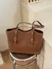 Bolso de diseño tejido de nicho para mujer, bolso de mano grande de moda primavera/verano 2026, bolso de hombro casual de moda
