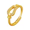 Nuevo anillo retorcido con hebilla de herradura incrustada de diamantes para mujer, moderno y versátil, diseño de nicho, sensación de alta gama, anillo simple y ajustable