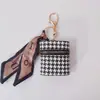 Bolsa para Auriculares de Bienestar para Transmisión en Vivo de Comercio Electrónico Llavero Mini Bolso Portátil para Labial Cubierta Protectora para Auriculares Inalámbricos Bluetooth