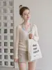 Suéter de punto para mujer, estilo francés, color avena suave, cuello en V, manga larga, nueva colección de otoño, con diseño calado, perfecto como capa exterior