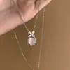 Collar de Flor de Calcedonia Blanca Imitación para Mujer, Cadena para Clavícula de Circonita Simple y de Alta Gama Incrustada con Diamantes, Colgante Redondo de Moda y Versátil
