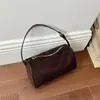 Nuevo bolso de moda de nicho esmerilado 2026 para debajo del brazo, bolso de mano retro de alta gama, bolso cruzado versátil para el hombro para mujer