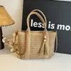 Bolsa de playa de gran capacidad para mujer, nuevo estilo verano 2025, bolso tote tejido a mano de paja casual para ir al trabajo