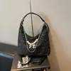 Mochila de estilo coreano con estrellas para mujer, nuevo modelo 2026, mochila con lazo de cadena, bolso tote cruzado de viaje