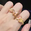 Libro Rojo Pequeño Explosiones Barbie Princesa Baile Mariposa Rosa Oro Esmalte Anillo Femenino Versalles Pera Perlada Hortensia Anillo de Dedo