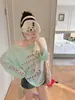 Blusa Holgada Transparente con Estampado de Graffiti para Mujer, Camiseta de Manga Larga Primavera/Verano, Top Asimétrico Chic sin Hombros