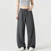 Pantalones deportivos de chándal versátiles de moda para mujer, talla grande, estilo americano de otoño, pantalones grises de pierna ancha, pantalones casuales fluidos para jóvenes, modernos