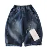 Calça Longa Infantil 2026 Outono Novidades Meninos e Meninas Patchwork Solta Jeans Estampado Bebê Estilo Coreano Calça Estrela