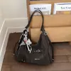 Bolsa Tote Retrô de Grande Capacidade 2025 Outono e Inverno Nova Tendência Moda Casual Bolsa de Braço Mochila Estilosa para o Dia a Dia