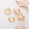 Anillo abierto estilo bohemio retro con forma de estrella de mar para mujer, estilo europeo y americano, ideal para vacaciones en la playa. Anillo ajustable con forma de concha.