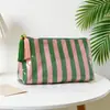 Bolsa de Maquiagem Transparente Listrada de PVC para Comércio Exterior Transfronteiriço com Zíper de Franja Bolsa de Higiene Pessoal Impermeável para Viagem Bolsa Portátil de Armazenamento