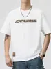 2026 Nueva Camiseta Casual Americana de Verano para Hombre Cuello Redondo Letra Manga Corta Moderna Versátil Camiseta de Media Manga Ropa para Hombre