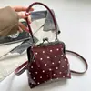 Bolso de mujer de alta gama 2026 Otoño Nuevo Bolso de axila para el trabajo Moda Diseño simple de nicho Bolso de hombro cruzado