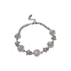 Pulsera de flor de calcedonia redonda con circonita microincrustada, estilo frío de lujo ligero, pulsera exquisita, joyería de moda versátil de alta gama