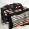 Color café con leche, bloques de color retro, estilo colegial, chaleco de punto grueso a rayas, cuello redondo, sin mangas, perfecto para usar en capas