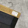 Tela de Mezclilla Oscura Lisa Cvc70/30 70 Algodón 30 Poliéster Mezclilla Que No Se Deslava Tela para Ropa Venta al por Mayor