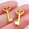 Mezcla 100 retro cinco colores corazón llave trébol de cuatro hojas llave aleación colgante hecho a mano diy accesorios de joyería venta al por mayor
