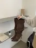 []Botas de Caballero con Hebilla y Tacón Fino 2026 Nuevas Botas Largas Retro de Ante con Tacón Alto Fruncidas Botas Caídas