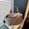 Bolsa transversal de grande capacidade para ir ao trabalho, bolsa tote casual feminina nova e moderna 2026, bolsa de mão em tecido de nylon