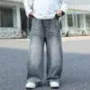 Calça Jeans Infantil 2026 Outono Novo Estilo para Crianças Médias e Grandes Calça Longa Lavada Solta em Formato de Foice Marca Tendência Versátil Casual