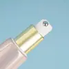 60ml Oro Rosa Cabezal Masajeador Rodante Tubo de Vacío Multimaterial Crema para Ojos Loción Corporal Empaque Cosmético Tubo Vacío