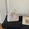 Bolsas de Luxo para Mulheres 2026 Novo Estilo Nicho Versátil Bolsa Transversal para o Dia a Dia Bolsa de Mão Fashion Retrô Bolsa Concha