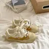 Zapatillas Blancas Casuales Versátiles de Diseño de Nicho de Alta Apariencia 2026 Verano Nuevos Zapatos de Lona con Cabeza de Gato Zapatillas Deportivas