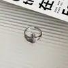Anillo de microincrustación de circonita de cobre de lujo ligero diseño Saturno anillo abierto acero de titanio personalidad cuenta redonda a juego anillo liso