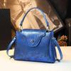 Bolso de mujer de lujo ligero de nicho de alta gama, artesanía láser, bolso de cuero genuino, versátil para el trabajo, estampado de serpiente, bolso de hombro cruzado, moda