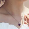 Europa y Estados Unidos transfronterizo AliExpress nuevo collar con colgante hueco de amor con incrustaciones de gema púrpura de moda personalizada al por mayor