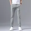 Pantalones Casuales Delgados de Seda Helada para Hombre Verano 2025 Pantalones Rectos Ajustados de Moda Pantalones de Color Sólido Elásticos Versátiles