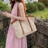 Bolsa de mano casual estilo coreano para mujer, nuevo modelo 2026, bolso de hombro simple y moderno para mujer, bolso de mano versátil
