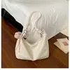 2026 Nova Moda Ins Estilo Coreano Retrô Cor Sólida Versátil Bolsa de Ombro Transversal Casual Feminina para Trabalho e Deslocamento