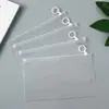 En stock bolsa con cierre de cremallera y lengüeta de PE transparente bolsa autosellable de plástico con anillo redondo esmerilado bolsa de almacenamiento de alta transparencia apertura autosellable empaque