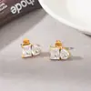 Pendientes de Botón Cuadrados Versátiles de Alta Gama con Circonita en Forma de Gota de Agua Bestseller Transfronterizo Sentido de Diseño de Nicho Joyería para Mujer al por Mayor