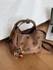 Bolsa de Couro Fosco para Axila Feminina 2026 Novo Estilo Design de Nicho Ombro Único Transversal Bolsa de Mão Feminina Estilo Versátil de Alta Qualidade