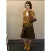 Saia Midi Tweed A-Line de Lã MMC Cintura Alta Outono 2026 Nova Saia Midi Plissada A-Line Emagrecedora 22183
