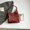 Bolsa de Ombro com Design de Nicho para Comércio Exterior Bolsa Feminina Nova Grande Capacidade Elegante Versátil Bolsa Saco Estilo Motociclista Rebite Axila