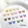 Yiwu joias de borboleta para nail art pequeno livro vermelho com impressão colorida joias de borboleta para nail art resina pequeno patch de borboleta