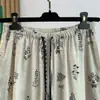 Pantalones anchos de algodón y lino con estampado estilo étnico para mujer, verano, elegantes, rejuvenecedores, con dobladillo tipo falda, pantalones casuales de algodón y lino de cintura alta retro