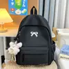 Mochila Estilo Japonés Fresca y Linda para Estudiantes Niñas, con Bordado y Moño, Color Sólido Elegante Mochila de Viaje