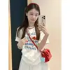 Camiseta de Manga Corta de Algodón Puro con Estampado de Pez Dorado y Letras Lindas Serie Miu para Mujer 2026 Nuevo Top Holgado de Verano