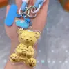 Chaveiro Urso de Ouro Puro 999 Desenho Animado Fofo Corrente para Celular Bolsa Pingente de Casal Pingente de Carro Ouro Shuibeijin