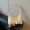 Bolso de axila tipo "dumpling" de estilo francés de nicho transfronterizo 2026 para mujer, bolso de mano moderno y de alta gama, bolso cruzado para el día a día