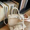 Bolso de mano liso transfronterizo para mujer, nuevo modelo 2026, bolso de hombro con textura de lichi, bolso cruzado de alta estética
