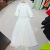Vestido de Lapela Falso Duas Peças Novo com Decoração de Fivela de Metal Pesado Estilo Europeu e Americano Niche Metal Heavy