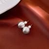 Pendientes de flor de perla de hada con aguja de plata chapada en oro real, pendientes de temperamento de moda, pendientes ligeros de lujo de alta gama, venta al por mayor para mujeres