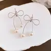 Hermosos Aretes Huecos de Perla con Lazo Estilo Francés, Pinzas para Oreja de Diseño de Nicho de Lujo Ligero, Aretes Versátiles Dulces y de Moda