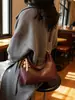 Bolsa Transversal de Ombro Feminina Casual Vintage de Nicho Nova Outono e Inverno 2026 Bolsa de Mão Versátil Bolsa de Axila